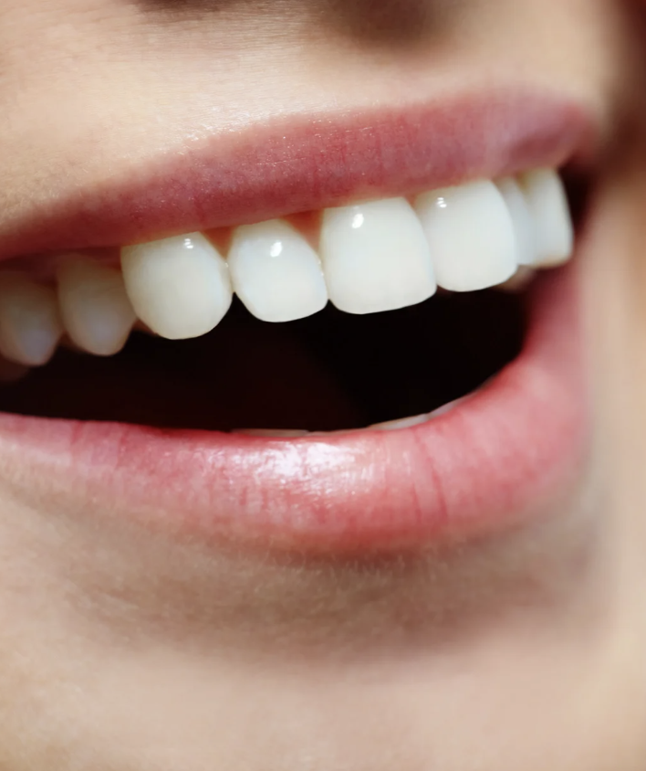 Transform Your Oral Health Naturally - Healthy smile with white teeth